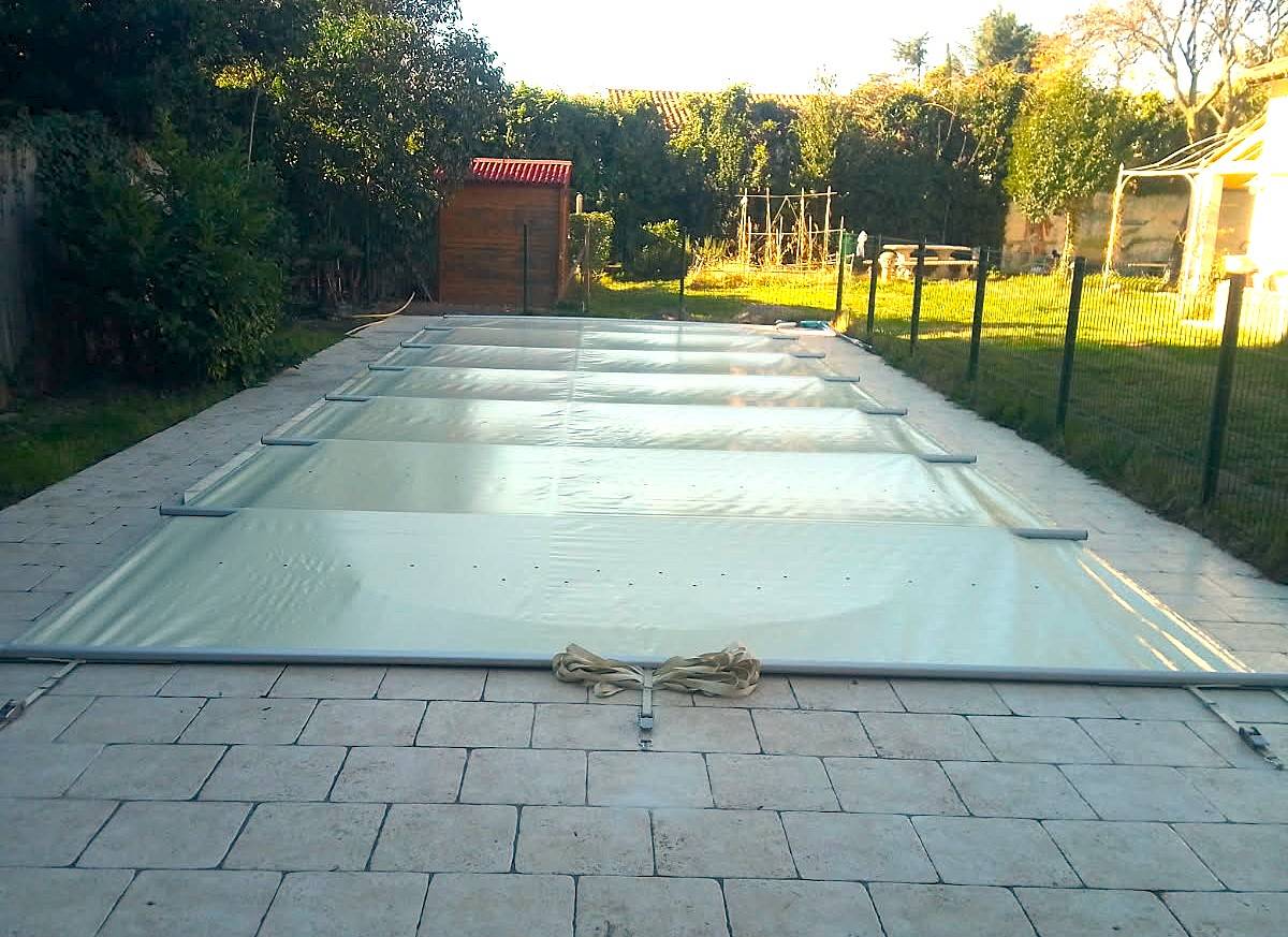 Pose d'une bâche à barre 4 saisons