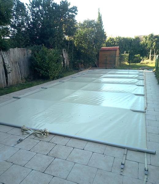 Pose d'une bâche à barre 4 saisons